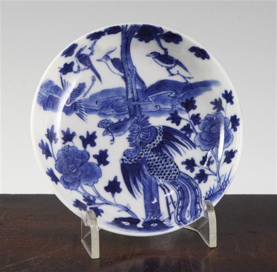 A Chinese blue and white phoenix and peony saucer dish, 19th century, 10.3cm